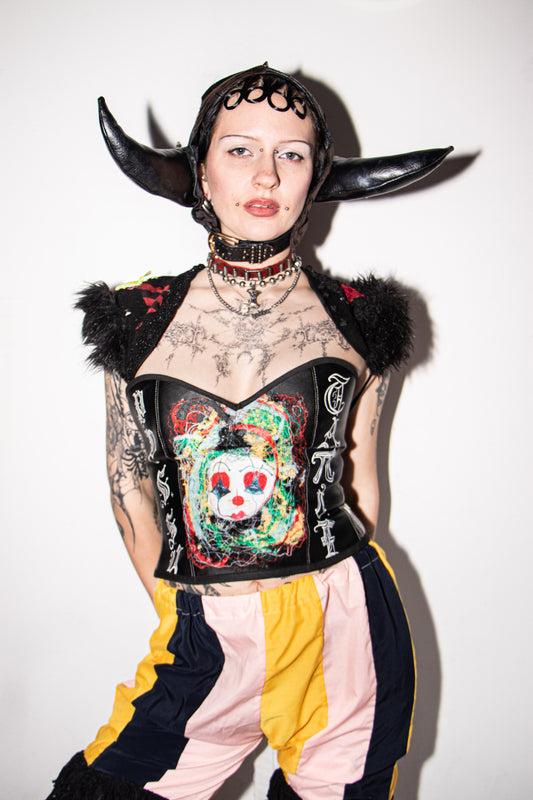 Pussy Tattie Clown thread portrait corset black pleather font striped